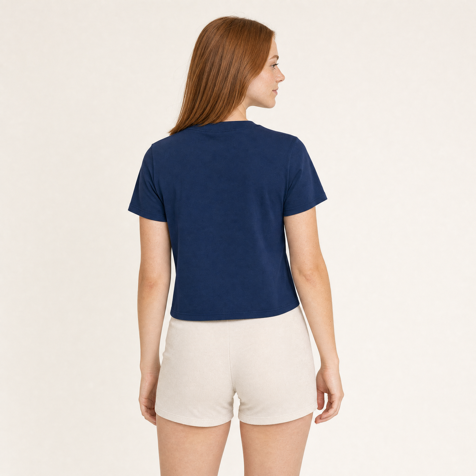 Nepo Baby Baby Tee — Nepo Baby - Navy — back view on model