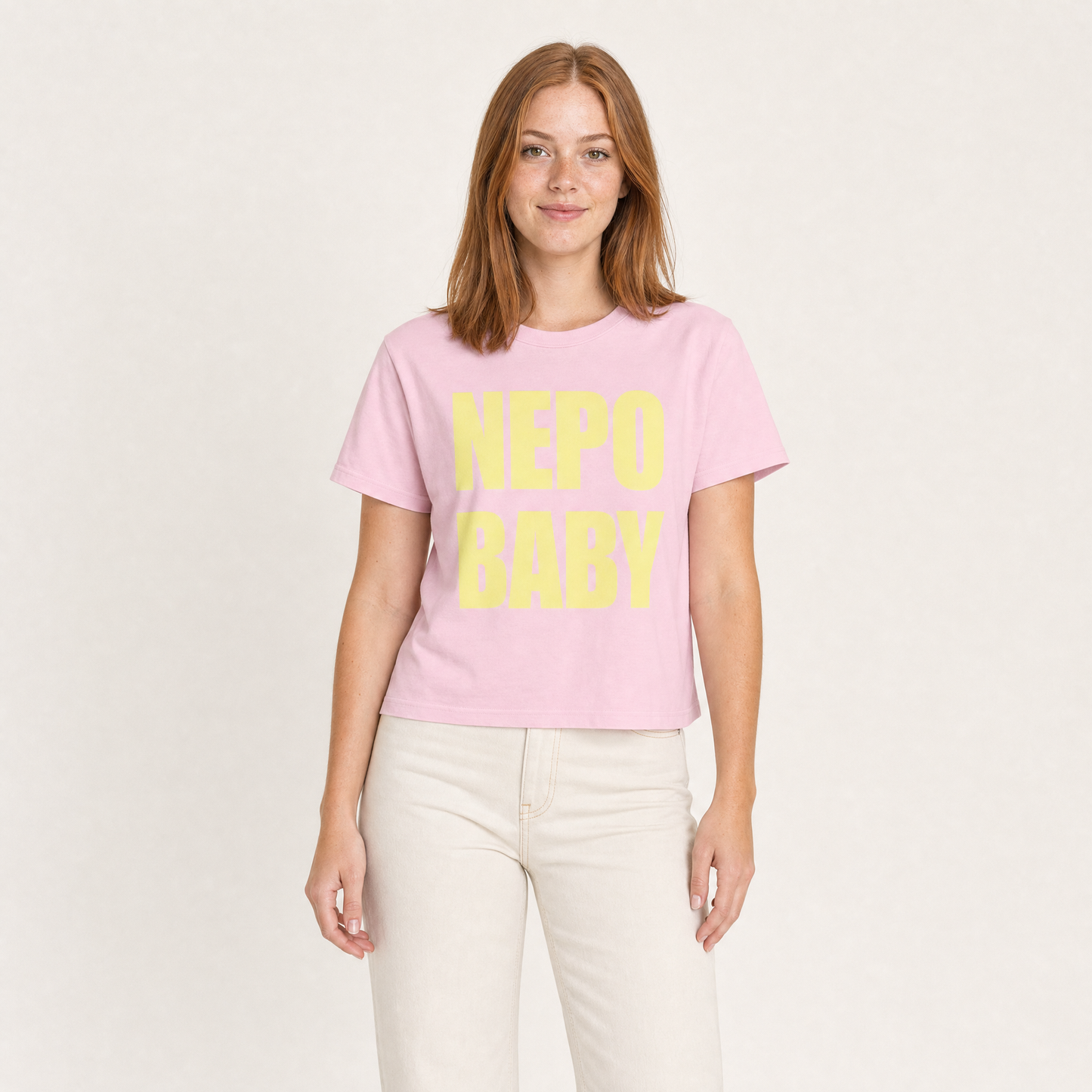 Nepo Baby Baby Tee — Nepo Baby - Pink — front view on model