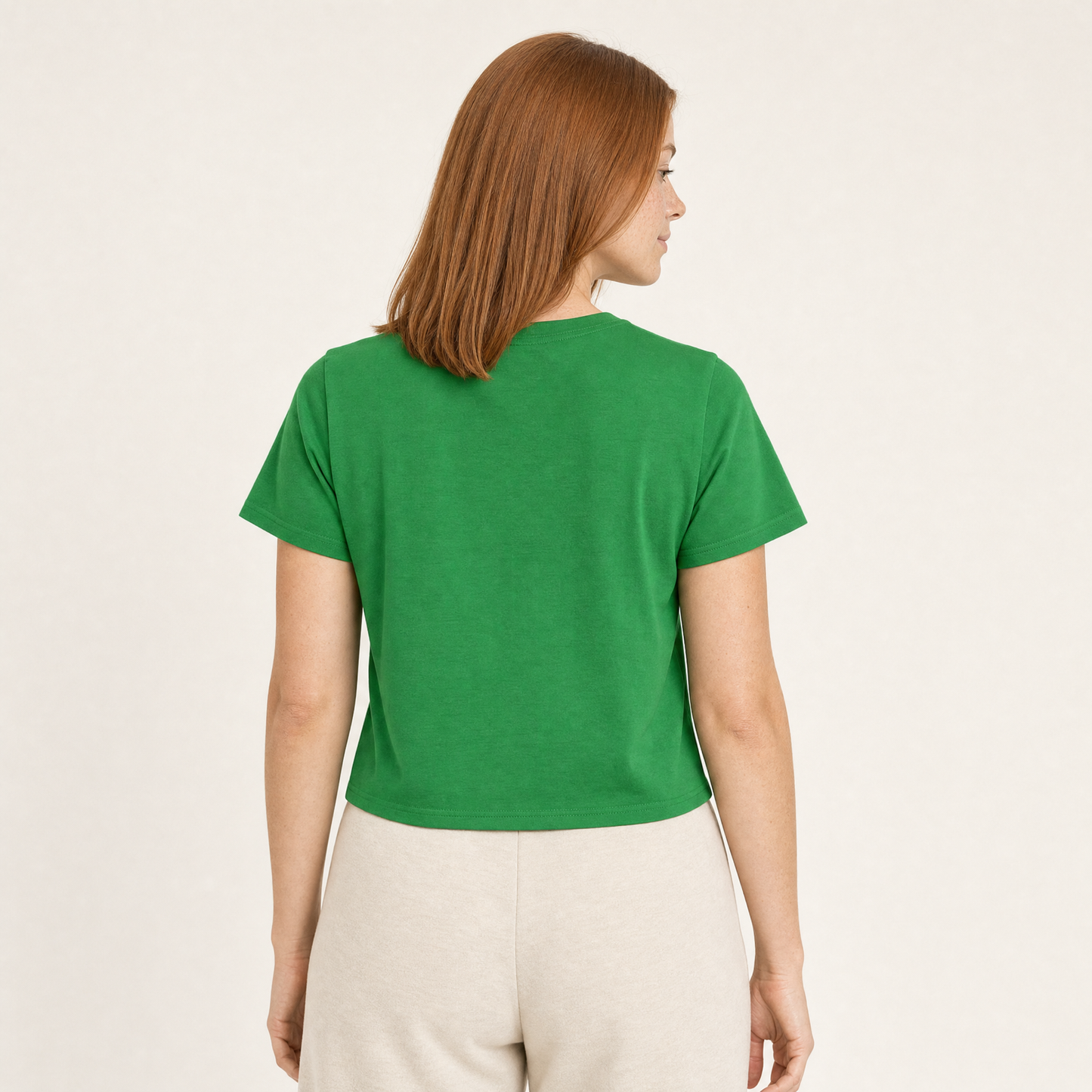 Nepo Baby Baby Tee — No More Mr. Nice Guy - Green — back view on model